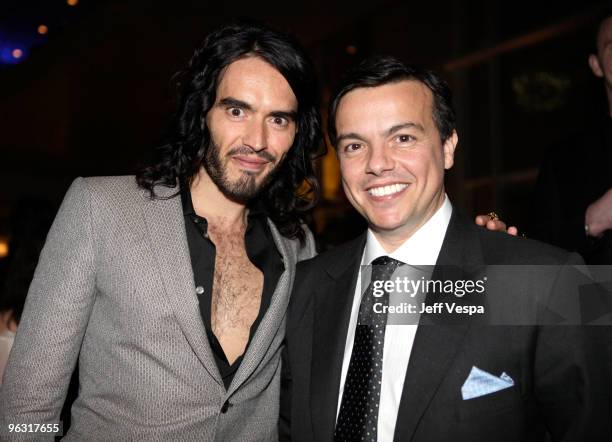 Comedian Russell Brand and Chief Executive Officer EMI Music Elio Leoni-Sceti attend the 2010 EMI Post GRAMMY Party at the W Hollywood Hotel and...