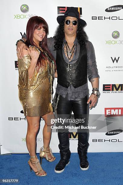 Musician Slash and Perla Ferrar attend the 2010 EMI GRAMMY Party at the W Hollywood Hotel and Residences on January 31, 2010 in Hollywood, California.