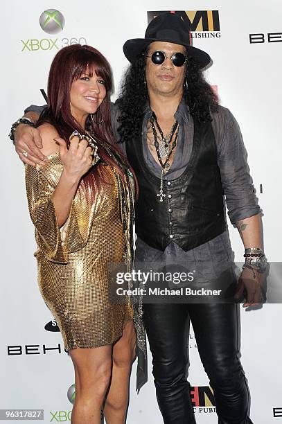 Musician Slash and Perla Ferrar attend the 2010 EMI GRAMMY Party at the W Hollywood Hotel and Residences on January 31, 2010 in Hollywood, California.