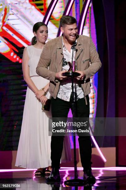Artist Francesca Battistelli presents an award to Cory Asbury onstage during the 6th Annual KLOVE Fan Awards at The Grand Ole Opry on May 27, 2018 in...