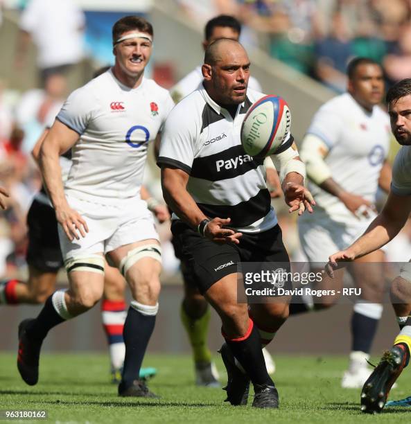 John Afoa of the Barbarians passes the ball during the Quilter Cup match between England and the Barbarians at Twickenham Stadium on May 27, 2018 in...