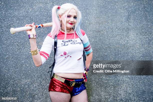 Cosplayers seen in character as Harley Quinn from Suicide Squad on the 3rd day of the MCM London Comic Con 2018 at ExCel on May 27, 2018 in London,...