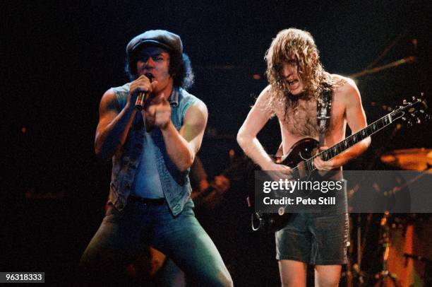 Brian Johnson and Angus Young of AC/DC perform on stage at Wembley Arena on January 17th, 1986 in London, United Kingdom.