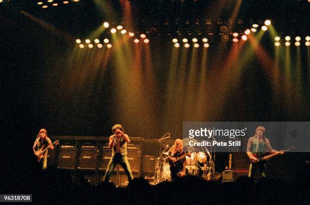 Malcolm Young, Brian Johnson, Angus Young and Cliff Williams of AC/DC perform on stage at Wembley Arena on January 17th, 1986 in London, United...