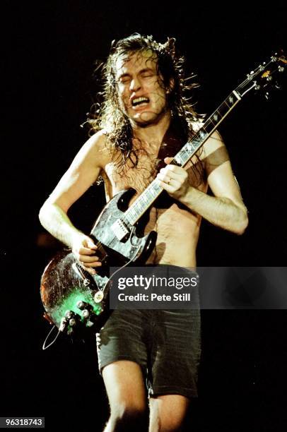 Angus Young of AC/DC performsS on stage at Wembley Arena on January 17th, 1986 in London, United Kingdom. He plays a Gibson SG Guitar.