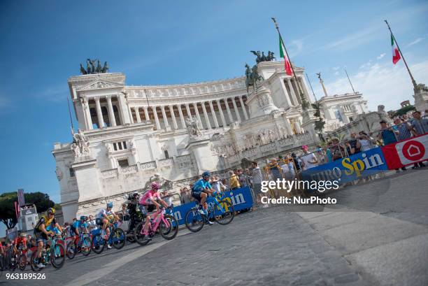 The pack of cyclists pedal past Rome's Vittoriano Unknown Soldier monument, during the last stage of the Giro d'Italia cycling race, in Rome, Sunday,...