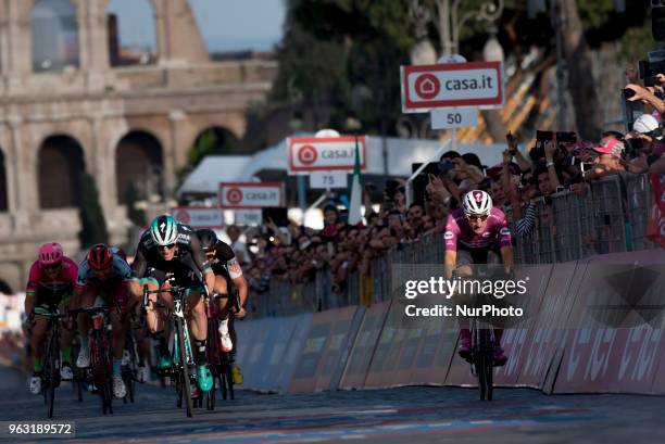 Irish rider Sam Bennett Bora-Hansgrohe celebrates as he crosses the finish line to win the twenty-first stage of the Giro d'Italia cycling race, over...