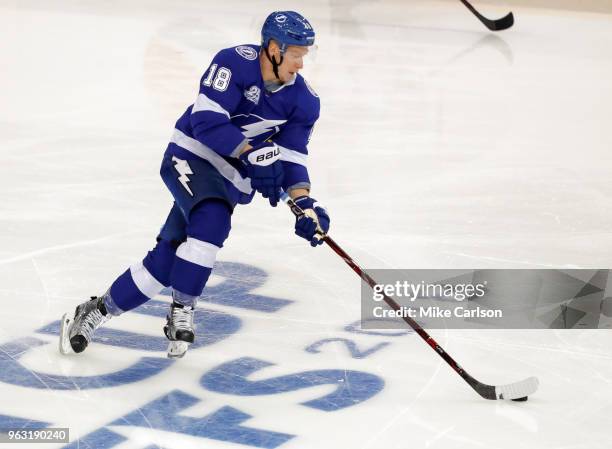 Ondrej Palat of the Tampa Bay Lightning move the puck against the Washington Capitals in Game Seven of the Eastern Conference Finals during the 2018...