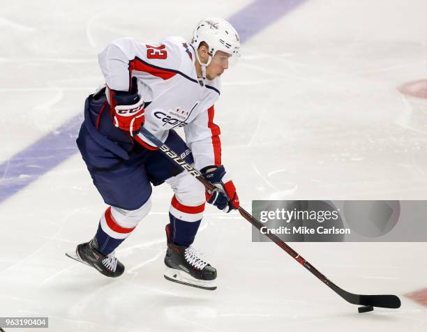 Jakub Vrana of the Washington Capitals moves the puck against the Tampa Bay Lightning in Game Seven of the Eastern Conference Finals during the 2018...