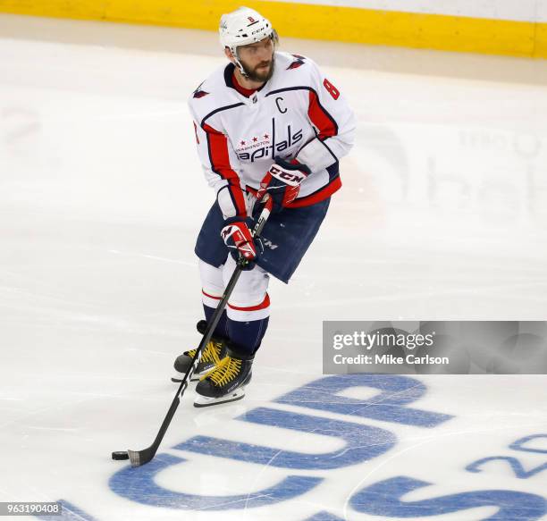 Alex Ovechkin of the Washington Capitals moves the puck against the Tampa Bay Lightning in Game Seven of the Eastern Conference Finals during the...