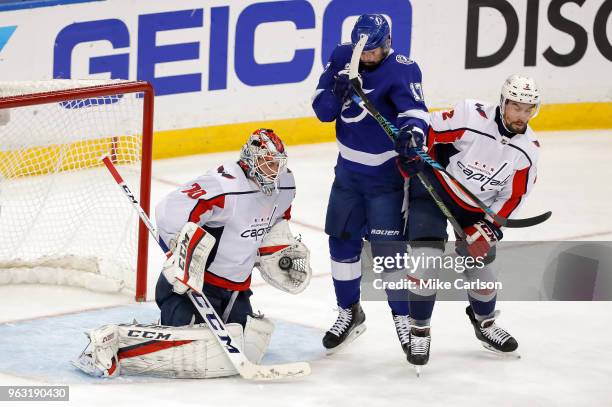 Braden Holtby of the Washington Capitals makes a save as Matt Niskanen defends against Alex Killorn of the Tampa Bay Lightning in Game Seven of the...