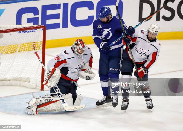 Braden Holtby of the Washington Capitals makes a save as Matt Niskanen defends against Alex Killorn of the Tampa Bay Lightning in Game Seven of the...
