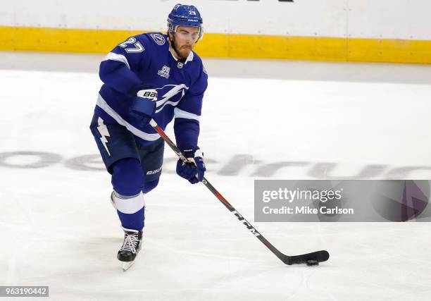 Ryan McDonagh of the Tampa Bay Lightning looks to move the puck against the Washington Capitals in Game Seven of the Eastern Conference Finals during...
