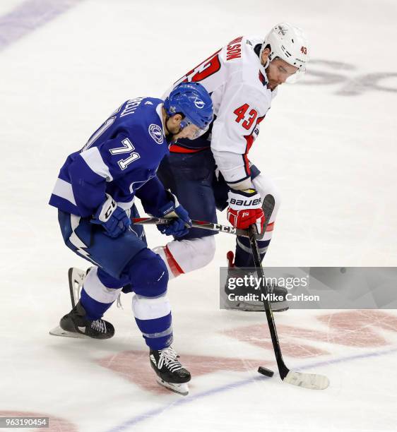 Anthony Cirelli of the Tampa Bay Lightning checks Tom Wilson of the Washington Capitals in Game Seven of the Eastern Conference Finals during the...