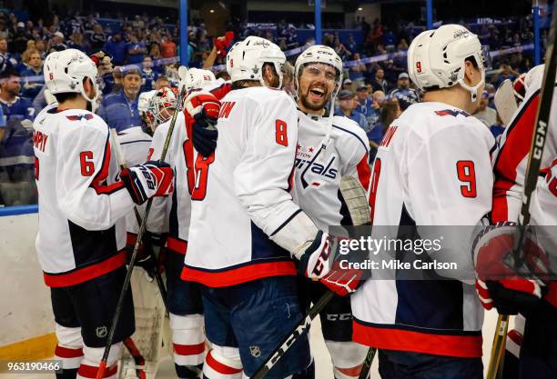 Members of the Washington Capitals celebrate a win over the Tampa Bay Lightning in Game Seven of the Eastern Conference Finals during the 2018 NHL...