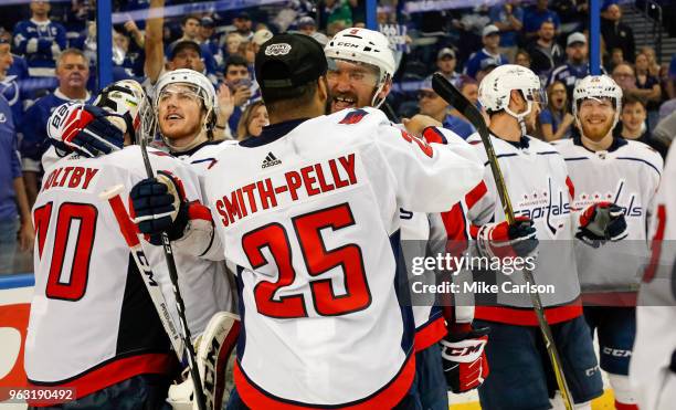 Members of the Washington Capitals celebrate a win over the Tampa Bay Lightning in Game Seven of the Eastern Conference Finals during the 2018 NHL...