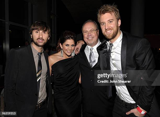 Musician Dave Haywood, Hillary Scott and Charles Kelley of Lady Antebellum pose with CEO of Capitol Records Nashville Mike Dungan at the 2010 EMI...