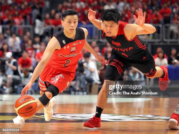Yuki Togashi of the Chiba Jets and Seiya Ando of theAlvark Tokyo compete for the ball during the B.League Championship final between Alvark Tokyo and...