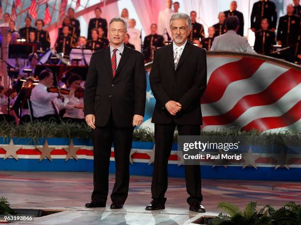 Hosts Gary Sinise and Joe Mantegna onstage during the 2018 National Memorial Day Concert at U.S. Capitol, West Lawn on May 27, 2018 in Washington, DC.