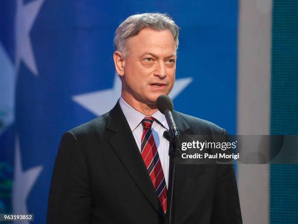 Co-host Gary Sinise speaks during the 2018 National Memorial Day Concert at U.S. Capitol, West Lawn on May 27, 2018 in Washington, DC.