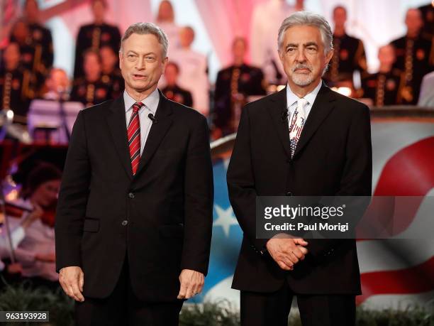 Hosts Gary Sinise and Joe Mantegna onstage during the 2018 National Memorial Day Concert at U.S. Capitol, West Lawn on May 27, 2018 in Washington, DC.