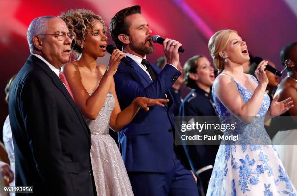 General Colin L. Powell, USA and performers Leona Lewis, Charles Esten and Megan Hilty onstage during the finale of the 2018 National Memorial Day...