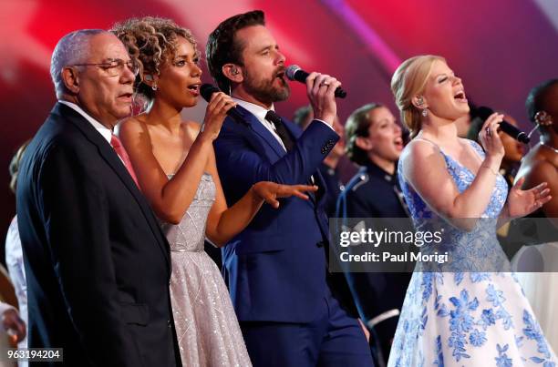 General Colin L. Powell, USA and performers Leona Lewis, Charles Esten and Megan Hilty onstage during the finale of the 2018 National Memorial Day...