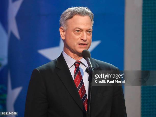 Co-host Gary Sinise speaks during the 2018 National Memorial Day Concert at U.S. Capitol, West Lawn on May 27, 2018 in Washington, DC.