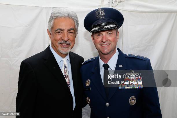 Co-host Joe Mantegna and Air Force General Joseph Lauren Lengyel pose for a photo backstage at the 2018 National Memorial Day Concert at U.S....