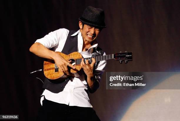 Ukulele virtuoso Jake Shimabukuro performs as a special guest of Bette Midler during the final performance of her show, "The Showgirl Must Go On" at...