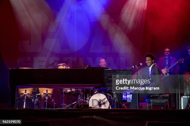 Pianist Jon Batiste with The Dap-Kings performs on stage during the 2018 Atlanta Jazz Festival at Piedmont Park on May 27, 2018 in Atlanta, Georgia.