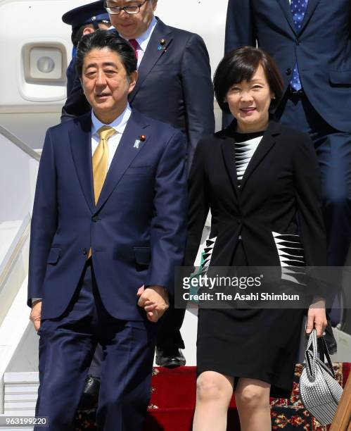 Japanese Prime Minister Shinzo Abe and his wife Akie are seen on arrival at Vnukovo International Airport on May 26, 2018 in Moscow, Russia. Abe and...