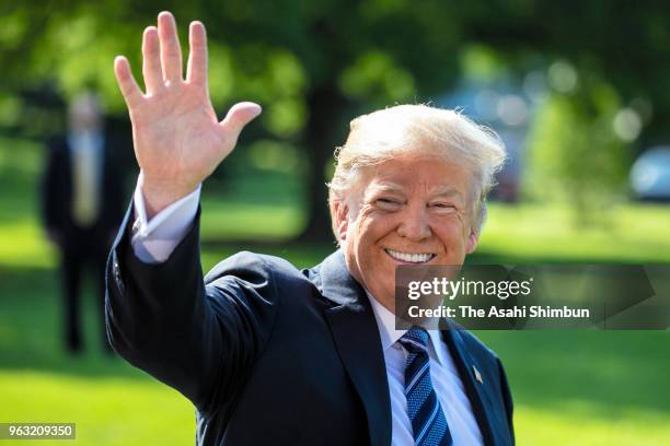 President Donald Trump talks to members of the news media before departing the White House on May 25, 2018 in Washington, DC. Trump is traveling to...