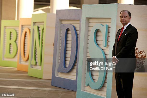 Xavier Rolet, the Chief Executive of the London Stock Exchange, poses for photographs in front of giant letter blocks spelling the word 'Bonds' on...