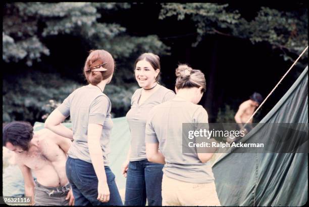 Women at the Woodstock music festival, August 1969. It is quite possible that these young women all dressed in lavendar t-shirts with their hair tied...