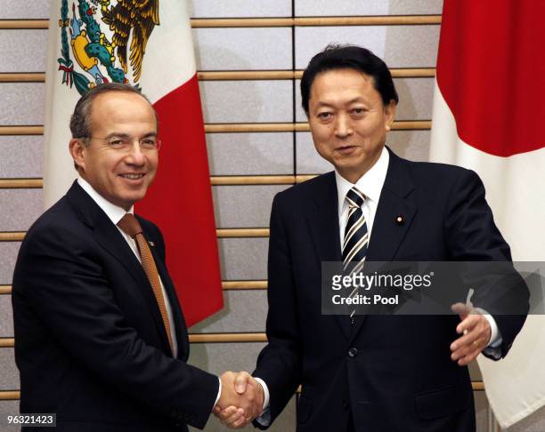 Mexican President Felipe Calderon shakes hands with Japan's Prime Minister Yukio Hatoyama prior to their joint press conference on February 1, 2010...