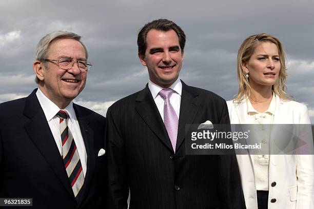 Exiled King Constantine of Greece, Prince Nikolaos of Greece and Ms Tatiana Blatnik during a photo call with the press following their engagement at...