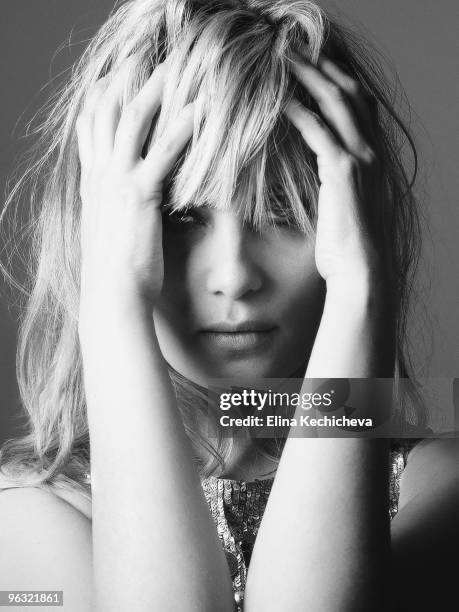 Actress/singer Emmanuelle Seigner poses at a portrait session for Jalouse in Paris on March 10, 2007. .
