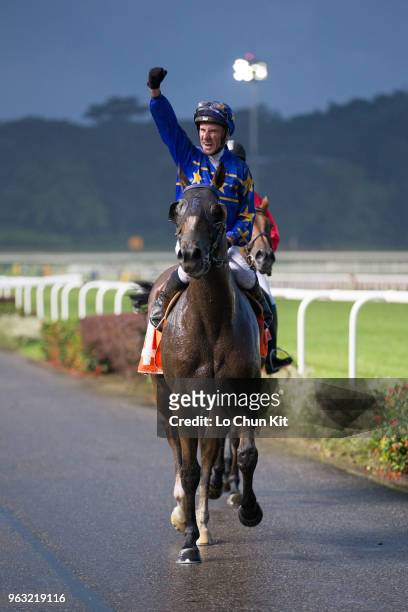 Jockey Glen Boss riding Lim's Cruiser wins Race 7 Lion City Cup at Kranji Race course on May 26 ,2018 in Singapore.