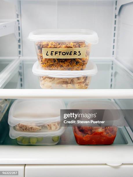 leftover containers in refrigerator - fridge full of food stockfoto's en -beelden