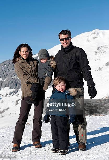 Danish Crown Prince Frederik and Crown Princess Mary pose for photgraphers with their children Prince Christian and Princess Isabella during their...