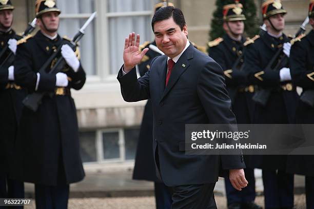 Turkmen President Gurbanguly Berdymukhamedov waves as he arrives before a working lunch with his French counterpart Nicolas Sarkozy on February 1,...