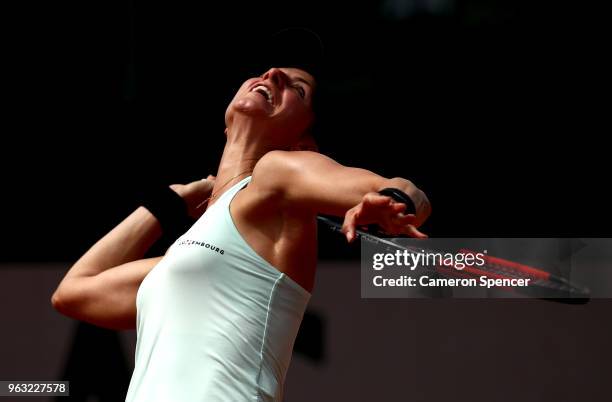 Mandy Minella of Luxembourg serves during the ladies singles first round match against Maria Sakkari of Greece during day two of the 2018 French Open...