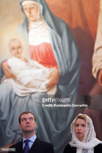 Russian President Dmitry Medvedev and his wife Svetlana Medvedeva attend a ceremony at the Christ the Savior Cathedral on February 1, 2010 in Moscow,...