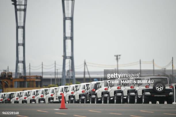 Toyota FJ Cruiser vehicles are seen parked at the Daikoku pier in Yokohama, Kanagawa prefecture on May 28, 2018.