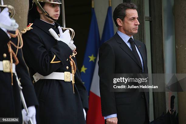 French President Nicolas Sarkozy waits his Turkmen counterpart Gurbanguly Berdymukhamedov prior to a working lunch on February 1, 2010 at the Elysee...