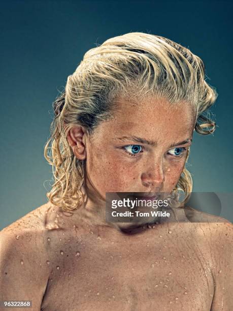 young angelic looking boy with wet blond hair - boy with long hair stock pictures, royalty-free photos & images
