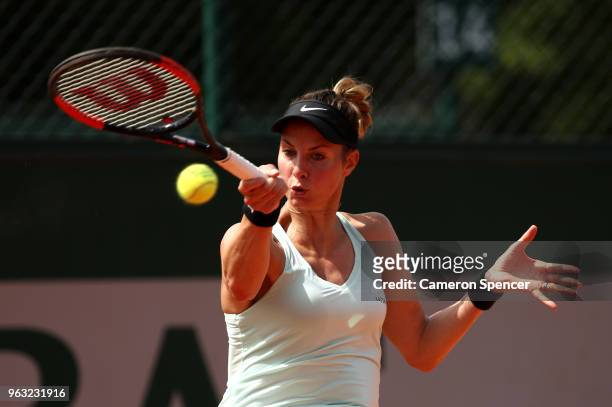 Mandy Minella of Luxembourg plays a forehand during the ladies singles first round match against Maria Sakkari of Greece during day two of the 2018...