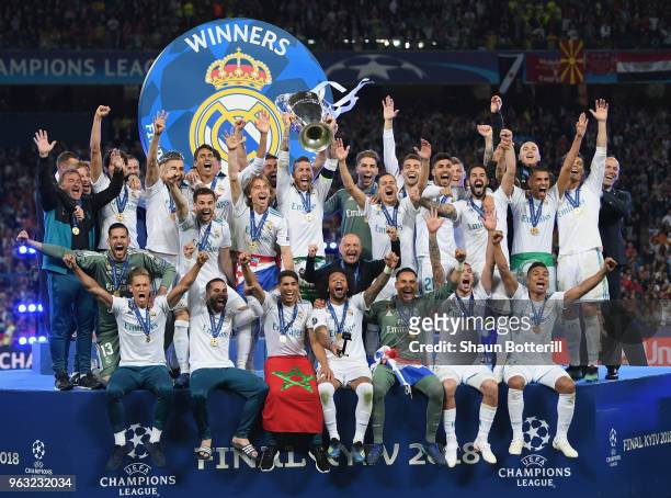 Real Madrid captain Sergio Ramos lifts the trophy after winning the UEFA Champions League final between Real Madrid and Liverpool on May 26, 2018 in...
