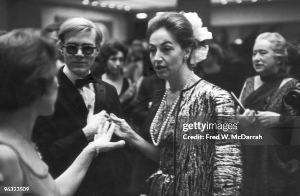 At the Museum of Modern Art's 'Responsive Eye' exhibition, American art collector and socialite Ethel Scull speaks with an unidentified woman as pop...